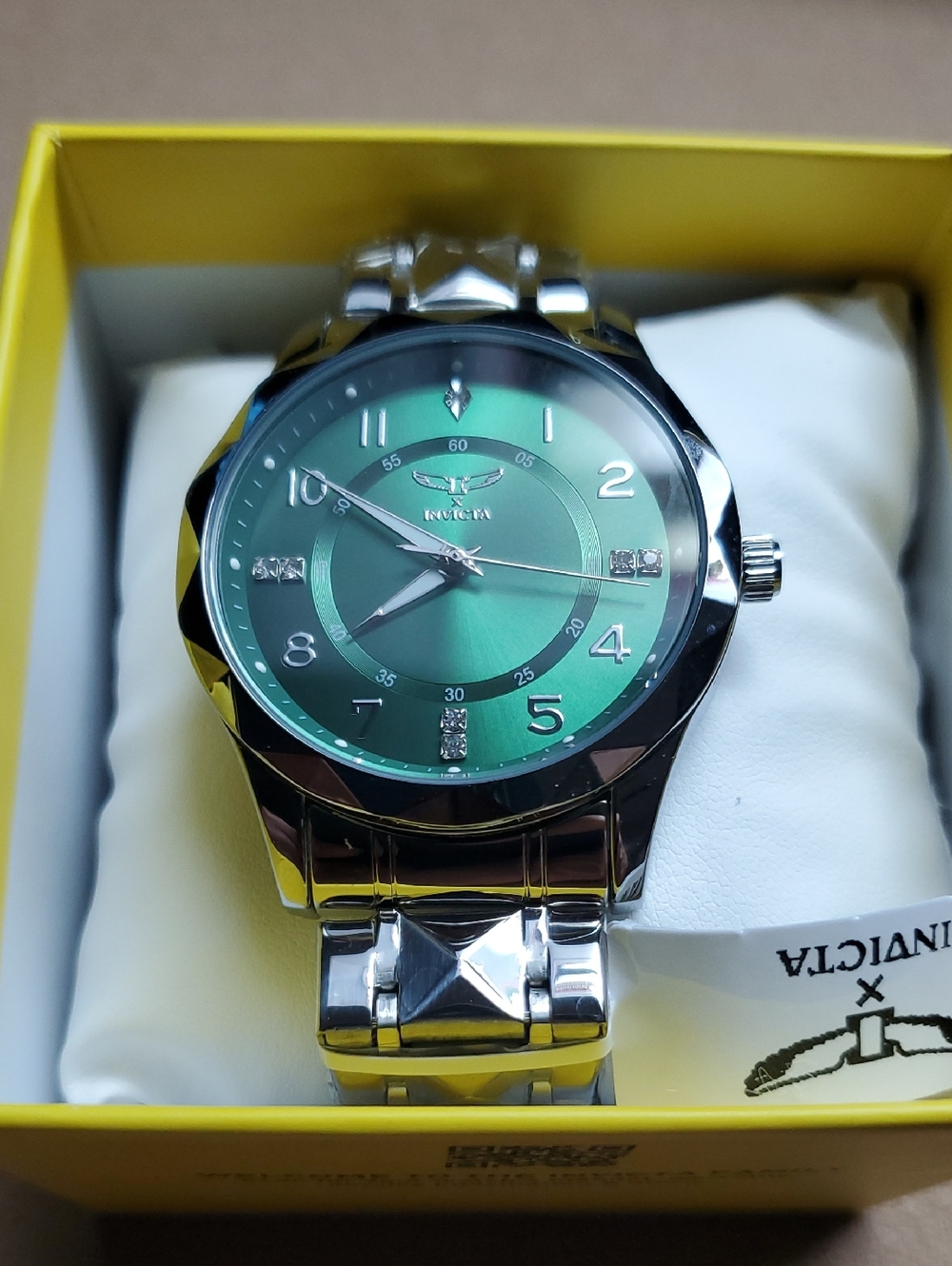 Invicta Silver Watch with Green Sunburst Dial
